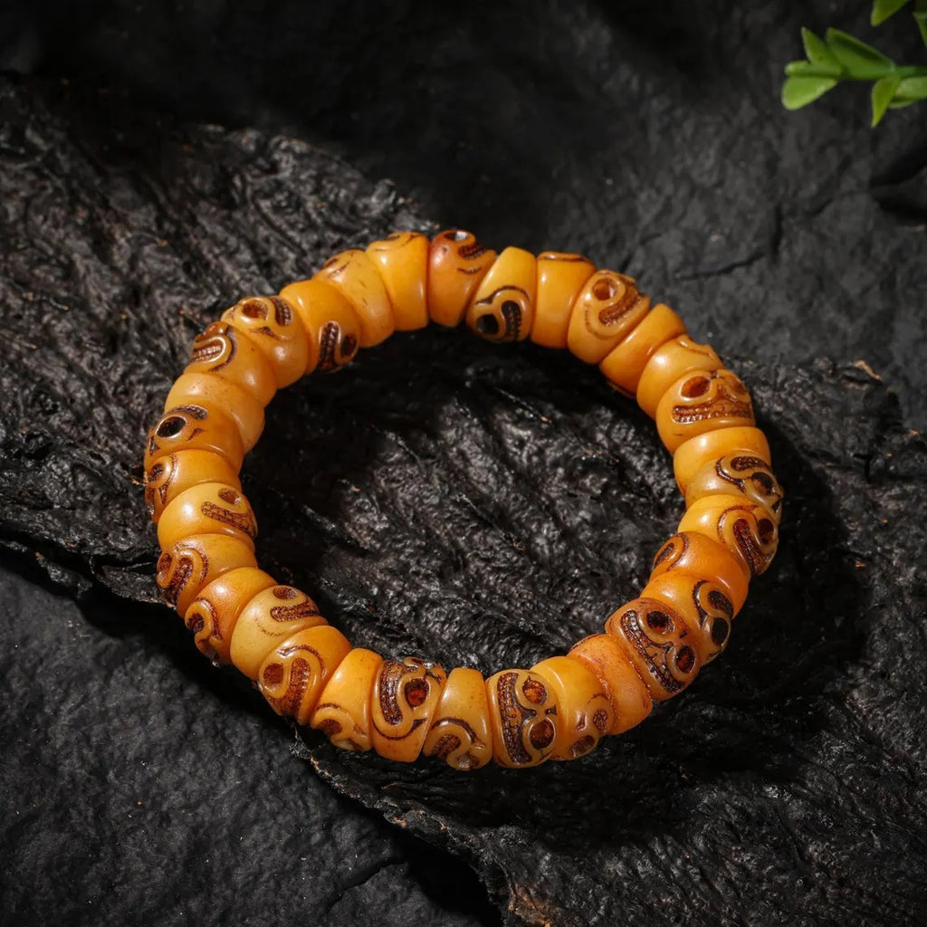Dharma Deer Yak Bone Smiling Skull Bracelet
