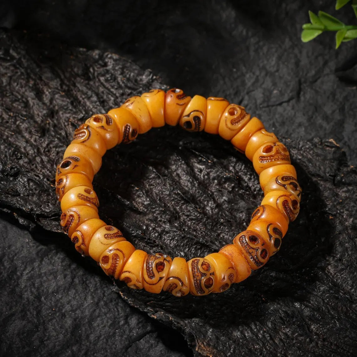 Dharma Deer Yak Bone Smiling Skull Bracelet