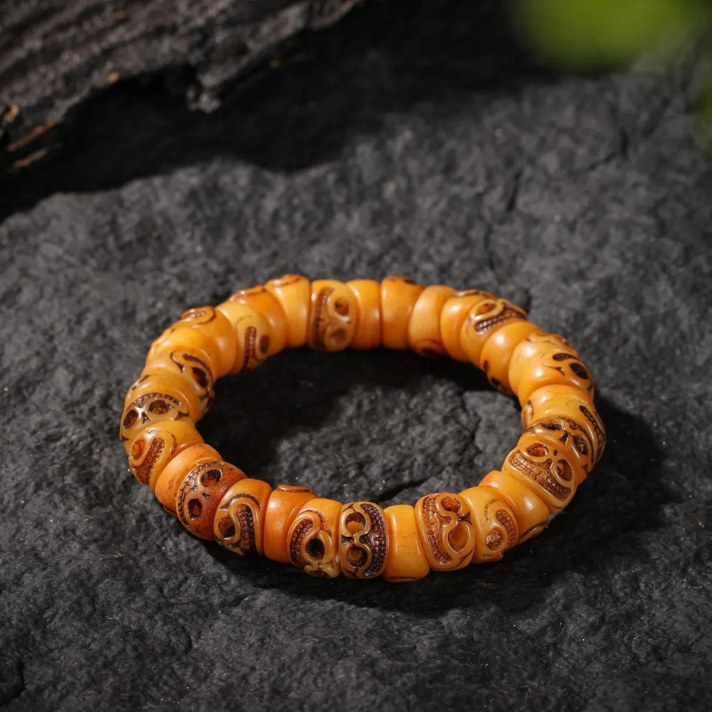 Dharma Deer Yak Bone Smiling Skull Bracelet