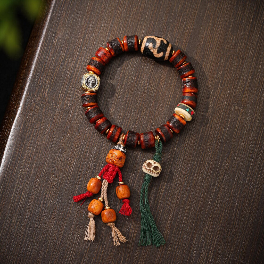 Dharma Deer Tibetan Red Yak Bone Bracelet with Skull Charm