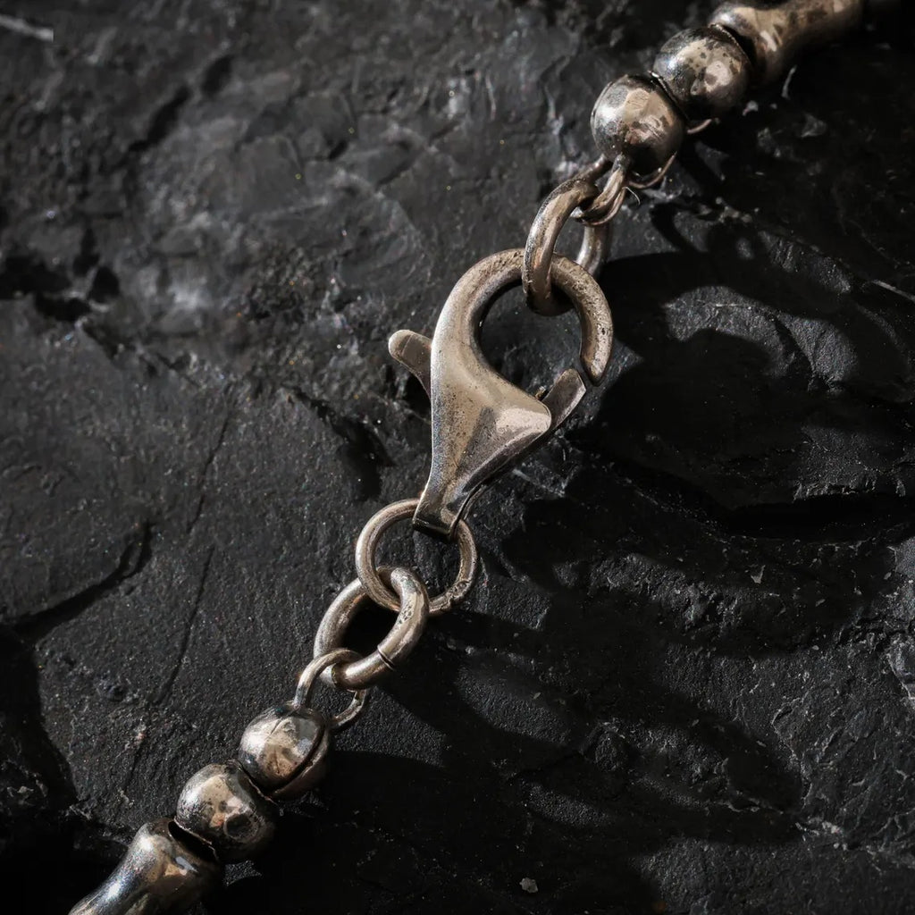 Dharma Deer Turquoise & Sterling Silver Skull Necklace | Om Mani Padme Hum Engraved Beads