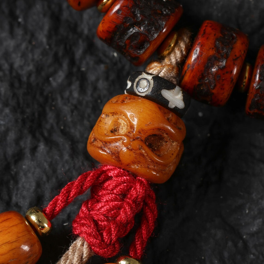 Dharma Deer Tibetan Red Yak Bone Bracelet with Skull Charm